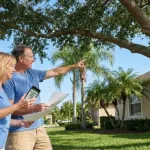 Homeowners discussing tree trimming laws in Florida